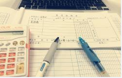 中秋聚会，职工中奖笔记本电脑1台，属于“偶然所得”还是“工资薪金所得”？